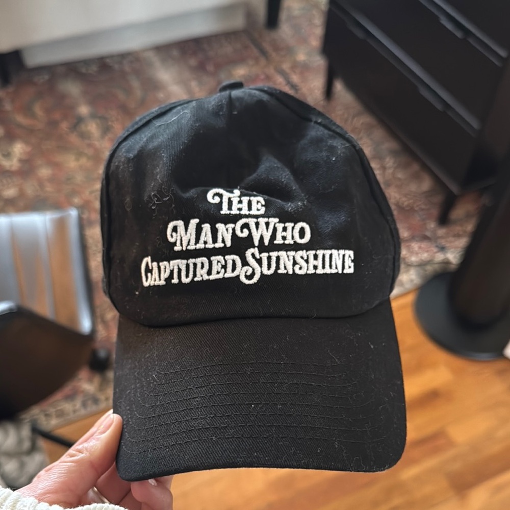 Black Baseball Cap with White Embroidered Slogan